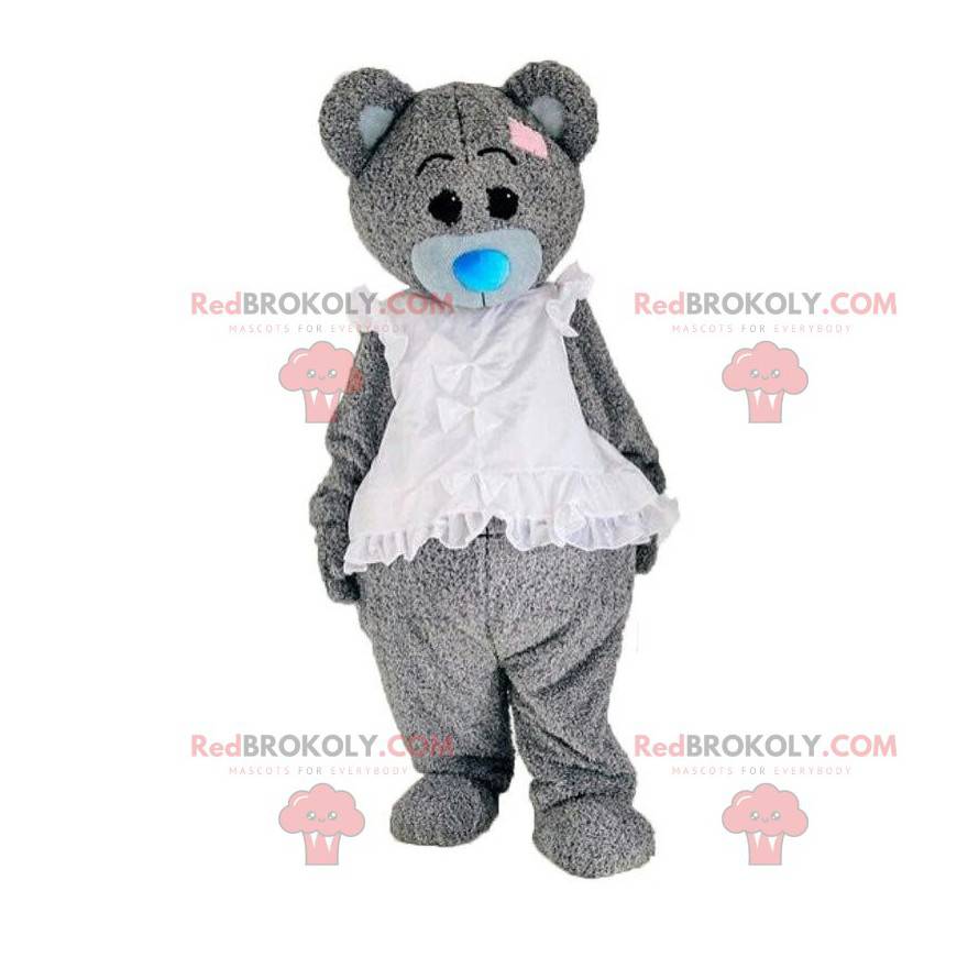 Teddy bear costume dressed in a white dress, elegant bear -