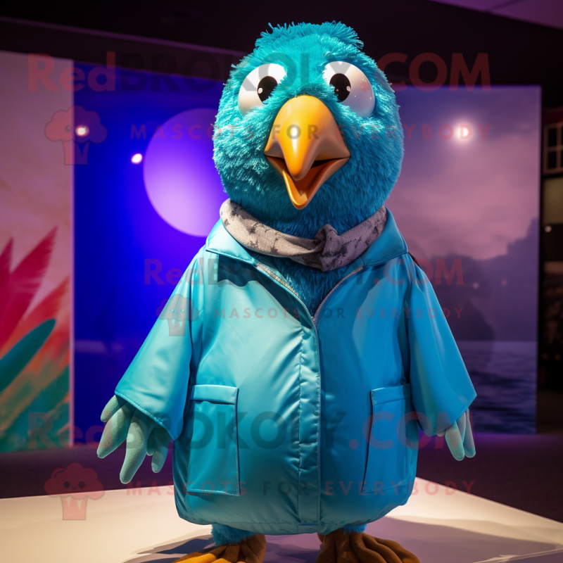 Turquoise Guinea Fowl mascot costume character dressed with a Windbreaker and Ties