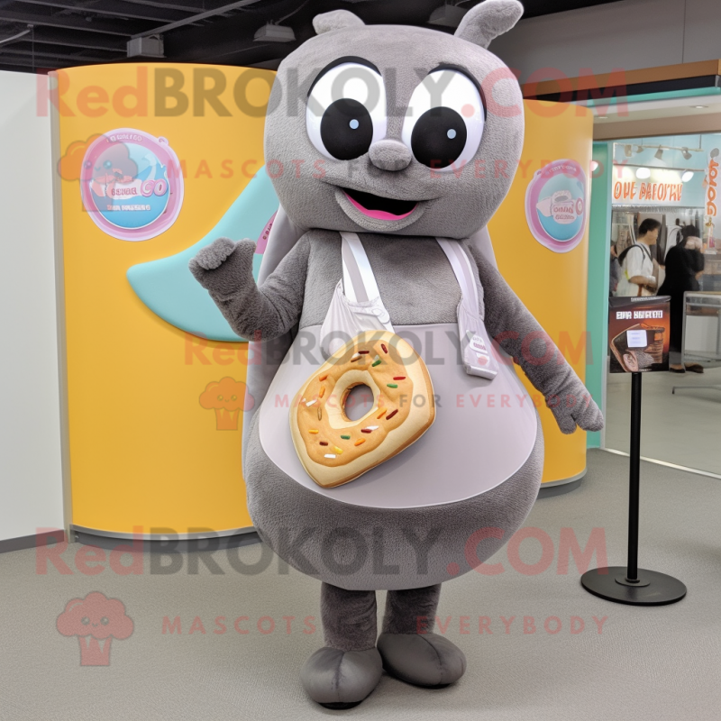 Gray Donut mascot costume character dressed with a A-Line Skirt and Messenger bags