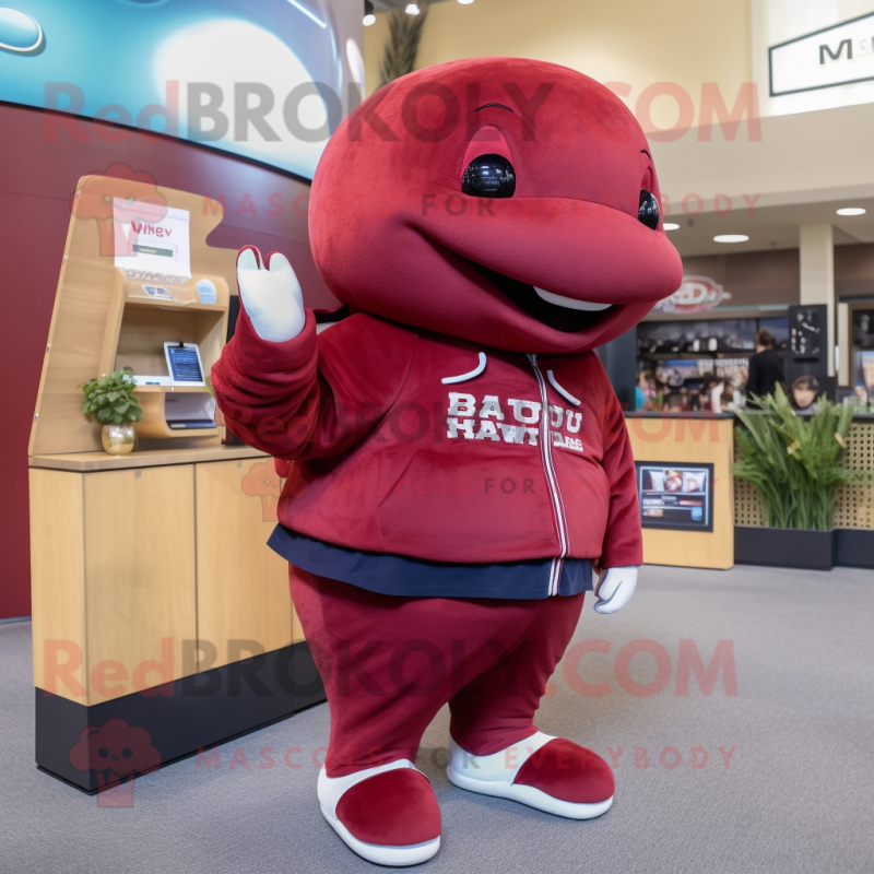 Maroon Whale mascot costume character dressed with a Sweatshirt and Wallets