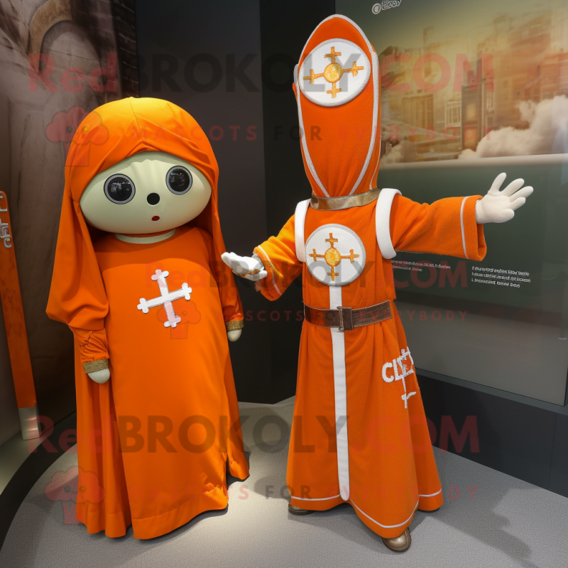Orange Celtic Cross mascot costume character dressed with a Wrap Dress and Brooches Orange Celtic Cross mascot costume character dressed with a Wrap Dress and Brooches