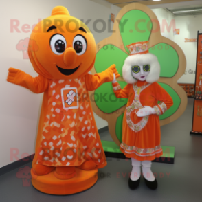 Orange Celtic Cross mascot costume character dressed with a Wrap Dress and Brooches