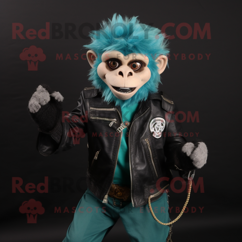 Teal Capuchin Monkey mascot costume character dressed with a Biker Jacket and Shawl pins Teal Capuchin Monkey mascot costume character dressed with a Biker Jacket and Shawl pins
