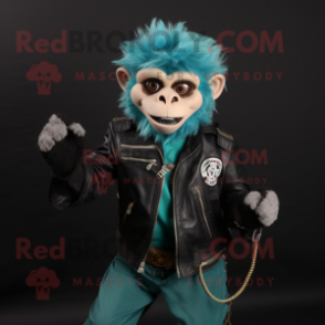 Teal Capuchin Monkey mascot costume character dressed with a Biker Jacket and Shawl pins