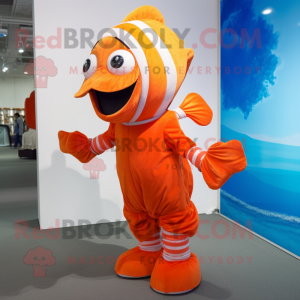 Orange Clown Fish mascot costume character dressed with a Cover-up and Ties