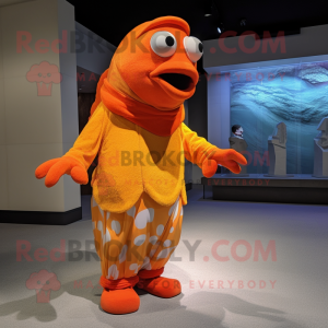 Orange Clown Fish mascot costume character dressed with a Cover-up and Ties