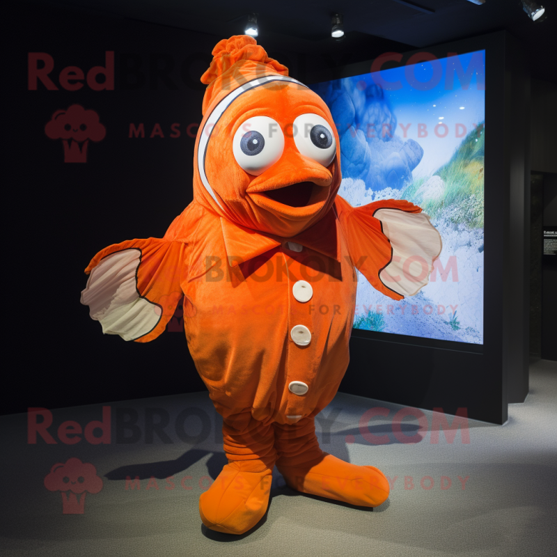 Orange Clown Fish mascot costume character dressed with a Cover-up and Ties