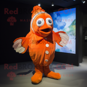 Orange Clown Fish mascot costume character dressed with a Cover-up and Ties