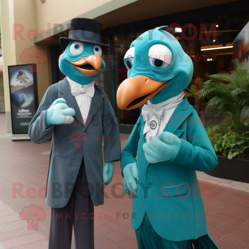 Teal Albatross mascot costume character dressed with a Suit and Cummerbunds