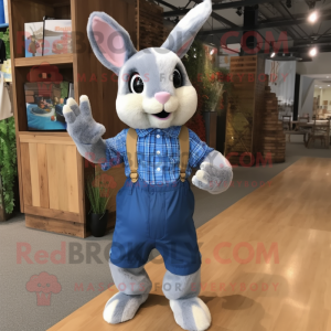 Blue Wild Rabbit mascot costume character dressed with a Flannel Shirt and Keychains