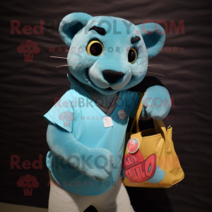 Cyan Jaguarundi mascot costume character dressed with a Poplin Shirt and Tote bags