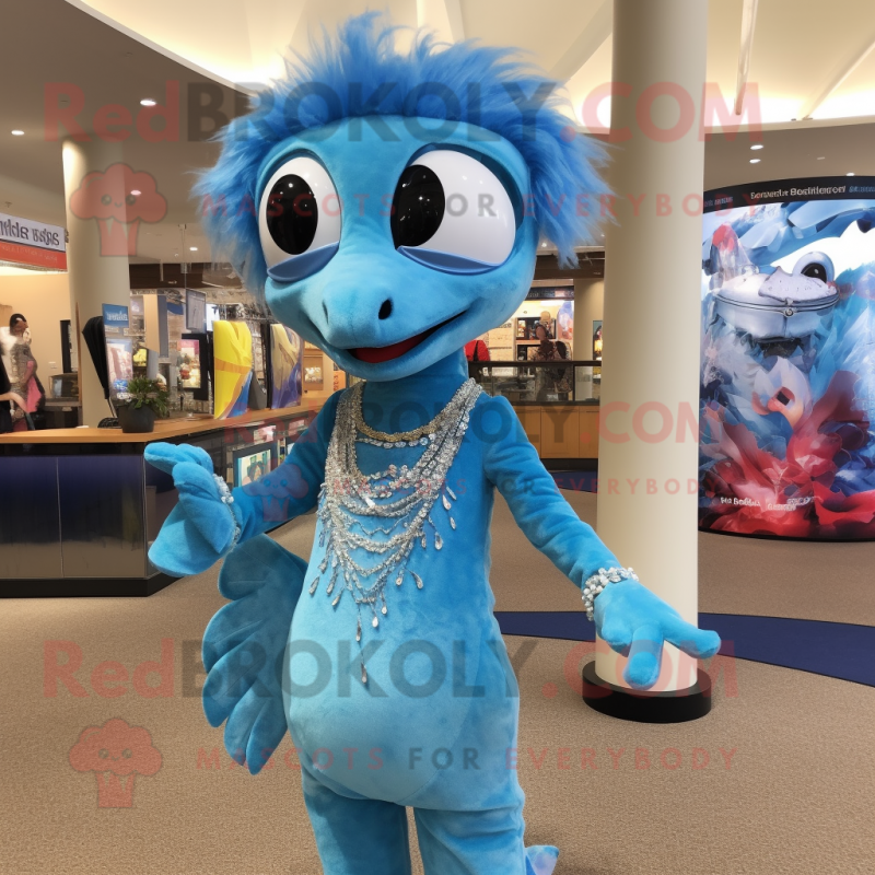 Sky Blue Barracuda mascot costume character dressed with a Shift Dress and Necklaces Sky Blue Barracuda mascot costume character dressed with a Shift Dress and Necklaces