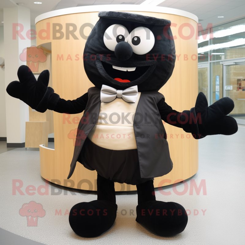 Black Bagels mascot costume character dressed with a Chinos and Bow ties Black Bagels mascot costume character dressed with a Chinos and Bow ties