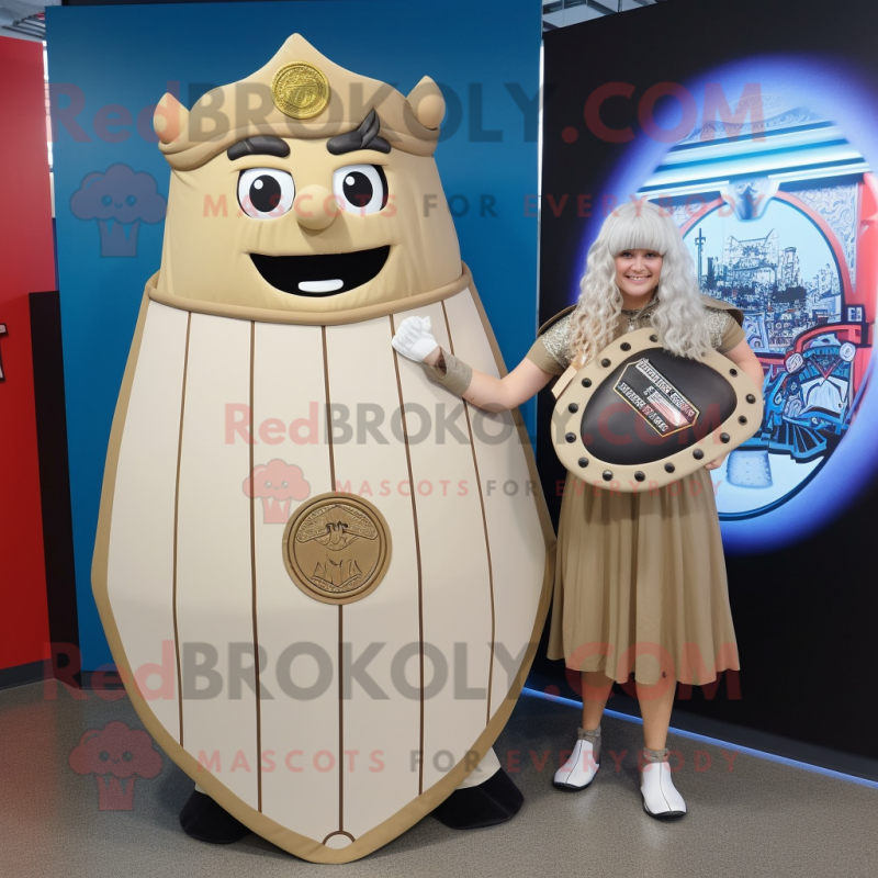Tan Celtic Shield mascot costume character dressed with a Empire Waist Dress and Keychains Tan Celtic Shield mascot costume character dressed with a Empire Waist Dress and Keychains