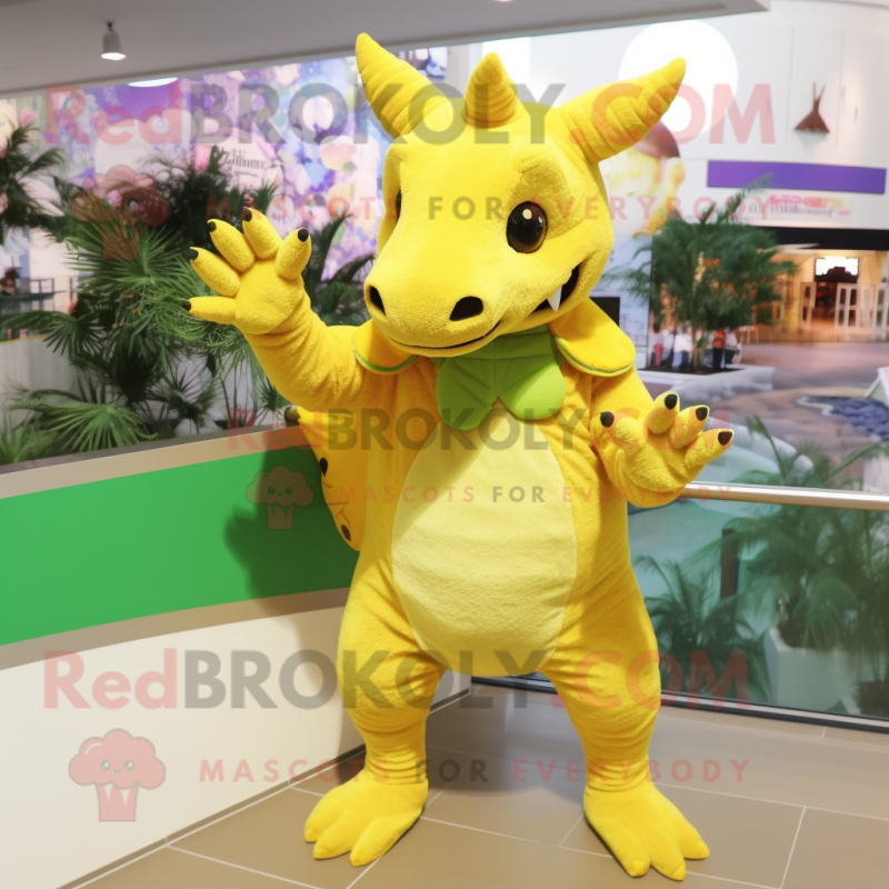 Yellow Triceratops mascot costume character dressed with a One-Piece Swimsuit and Mittens