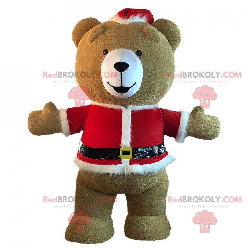 Teddy bear mascot dressed in inflatable Christmas outfit -