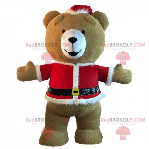 Teddy bear mascot dressed in inflatable Christmas outfit -