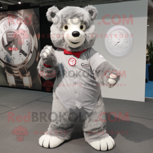 Silver Bear mascot costume character dressed with a Chinos and Bracelet watches