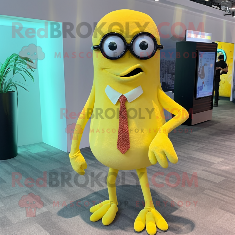 Lemon Yellow Kraken mascot costume character dressed with a Dress Pants and Eyeglasses Lemon Yellow Kraken mascot costume character dressed with a Dress Pants and Eyeglasses