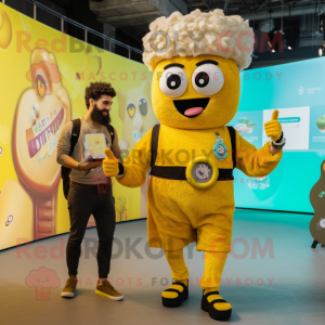 Yellow Falafel mascot costume character dressed with a Playsuit and Smartwatches