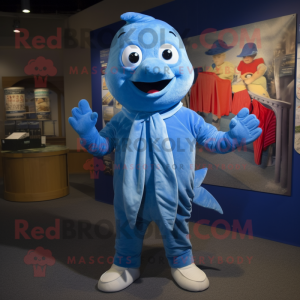 Blue Cod mascot costume character dressed with a Henley Shirt and Shawls
