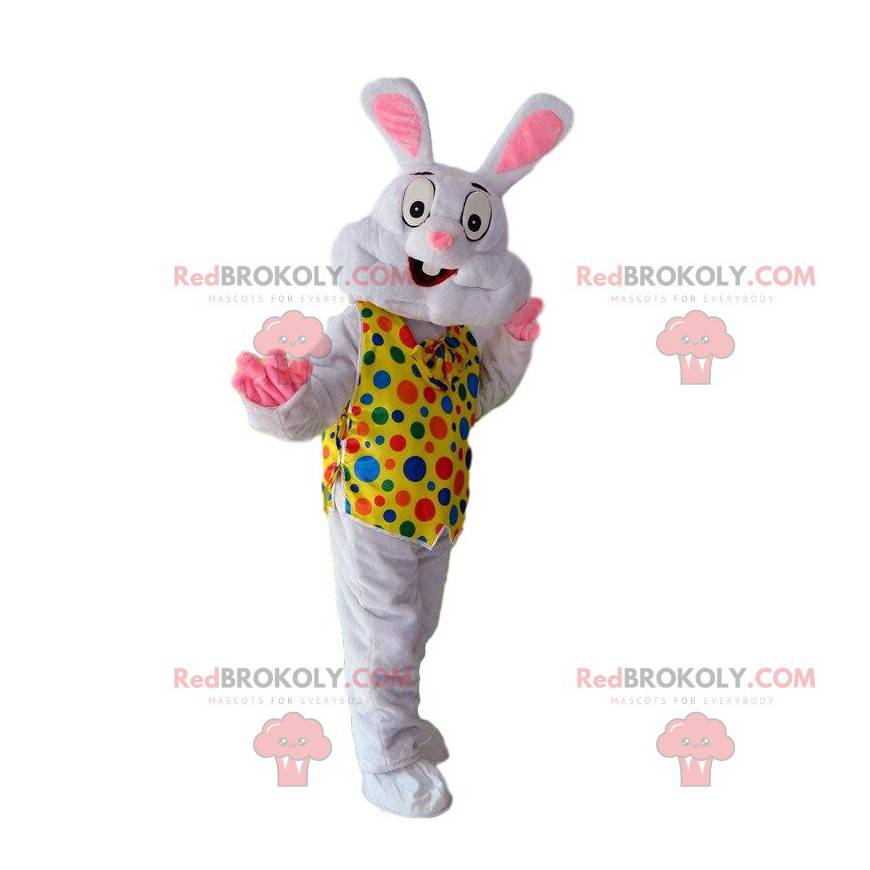 White rabbit mascot with a yellow vest with colored dots -