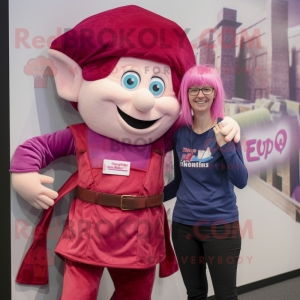 Magenta Elf mascot costume character dressed with a Mom Jeans and Ties