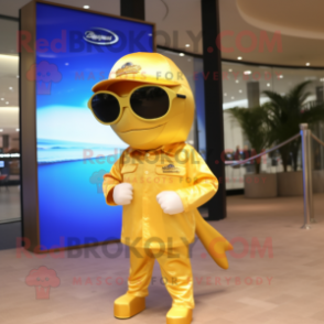 Gold Dolphin mascot costume character dressed with a Shorts and Sunglasses