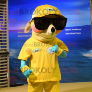 Gold Dolphin mascot costume character dressed with a Shorts and Sunglasses