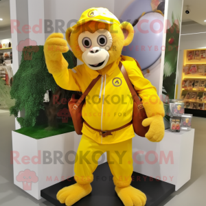 Yellow Monkey mascot costume character dressed with a Dress and Backpacks