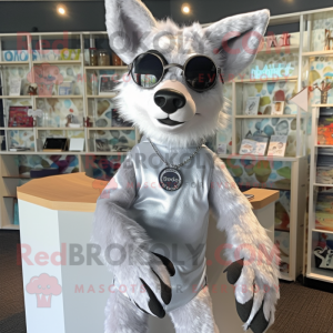 Silver Dingo mascot costume character dressed with a Wrap Dress and Reading glasses