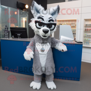 Silver Dingo mascot costume character dressed with a Wrap Dress and Reading glasses