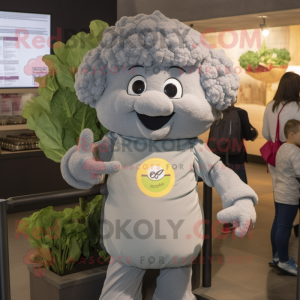 Gray Cauliflower mascot costume character dressed with a Henley Shirt and Digital watches