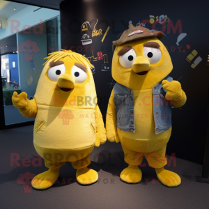 Gold Kiwi mascot costume character dressed with a Boyfriend Jeans and Suspenders