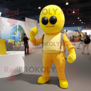 Lemon Yellow Human Cannon Ball mascot costume character dressed with a Sweatshirt and Suspenders