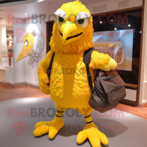 Yellow Eagle mascot costume character dressed with a Joggers and Messenger bags