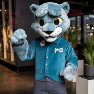 Teal Puma mascot costume character dressed with a Jeans and Lapel pins