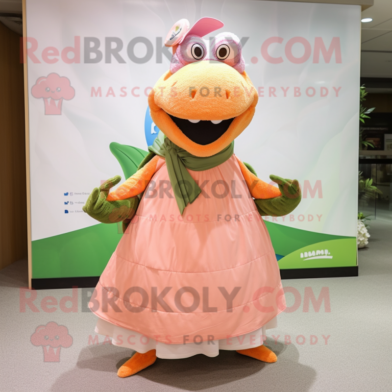 Peach Crocodile mascot costume character dressed with a Maxi Skirt and Shawls Peach Crocodile mascot costume character dressed with a Maxi Skirt and Shawls