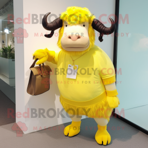 Lemon Yellow Yak mascot costume character dressed with a Culottes and Clutch bags