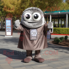 Gray Chocolates mascot costume character dressed with a T-Shirt and Scarves