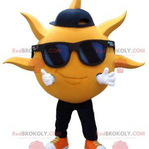 Mascota en forma de sol amarillo con gafas de sol -