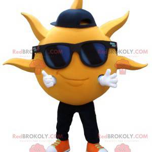 Mascotte en forme de soleil jaune avec des lunettes de soleil -