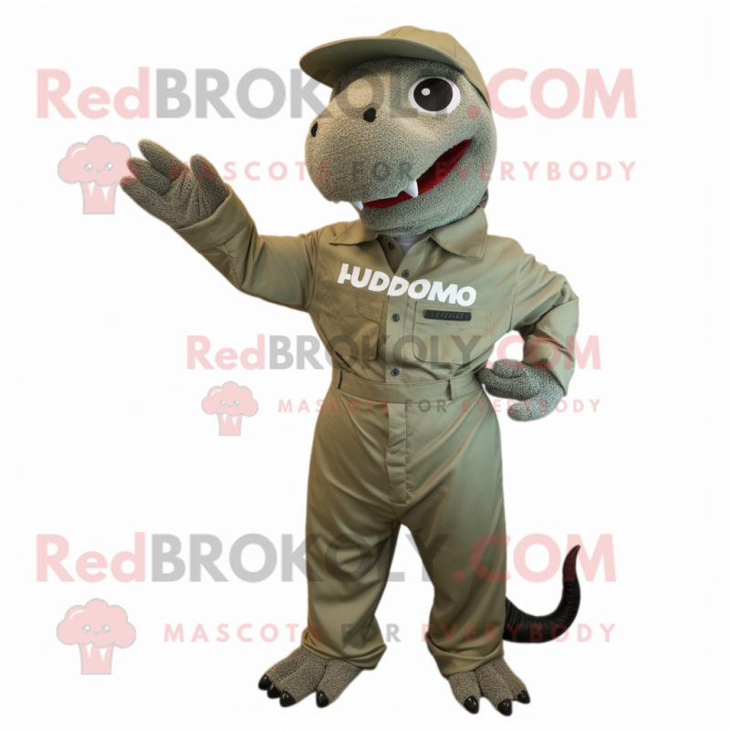 Olive Komodo Dragon mascot costume character dressed with a Overalls and Cufflinks Olive Komodo Dragon mascot costume character dressed with a Overalls and Cufflinks
