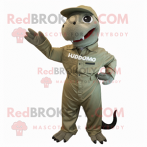 Olive Komodo Dragon mascot costume character dressed with a Overalls and Cufflinks