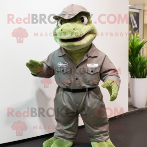 Olive Komodo Dragon mascot costume character dressed with a Overalls and Cufflinks
