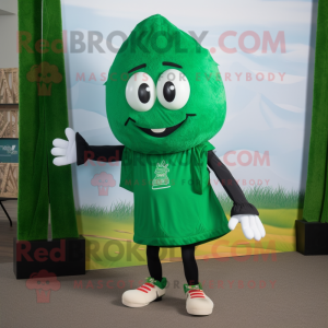 Forest Green Shakshuka mascot costume character dressed with a Bermuda Shorts and Shoe laces