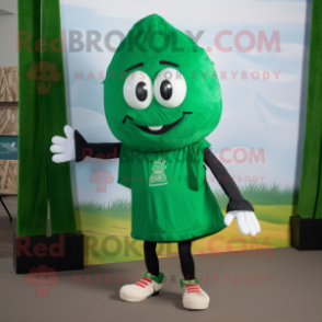 Forest Green Shakshuka mascot costume character dressed with a Bermuda Shorts and Shoe laces
