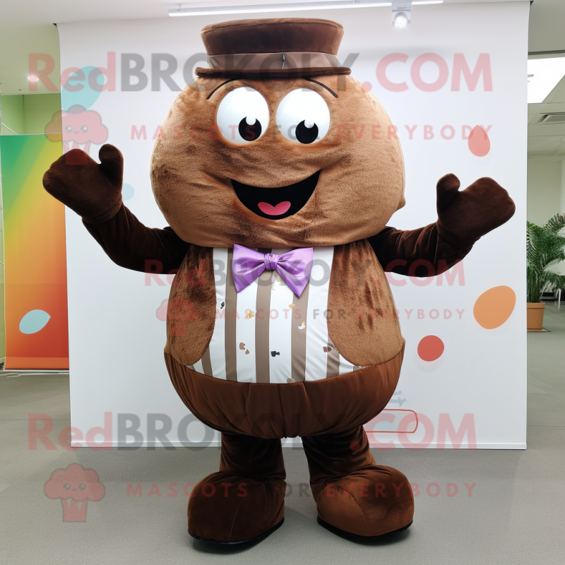 Brown Cupcake mascot costume character dressed with a Waistcoat and Suspenders