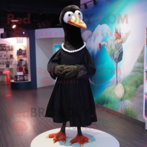 Black Albatross mascot costume character dressed with a Wrap Dress and Bow ties