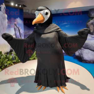 Black Albatross mascot costume character dressed with a Wrap Dress and Bow ties